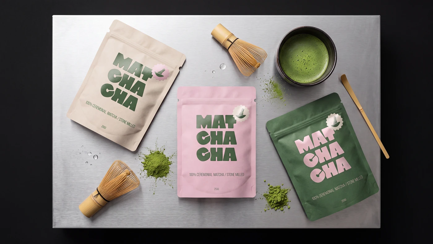 Matchacha branding packaging pouches flat lay with bamboo whisk