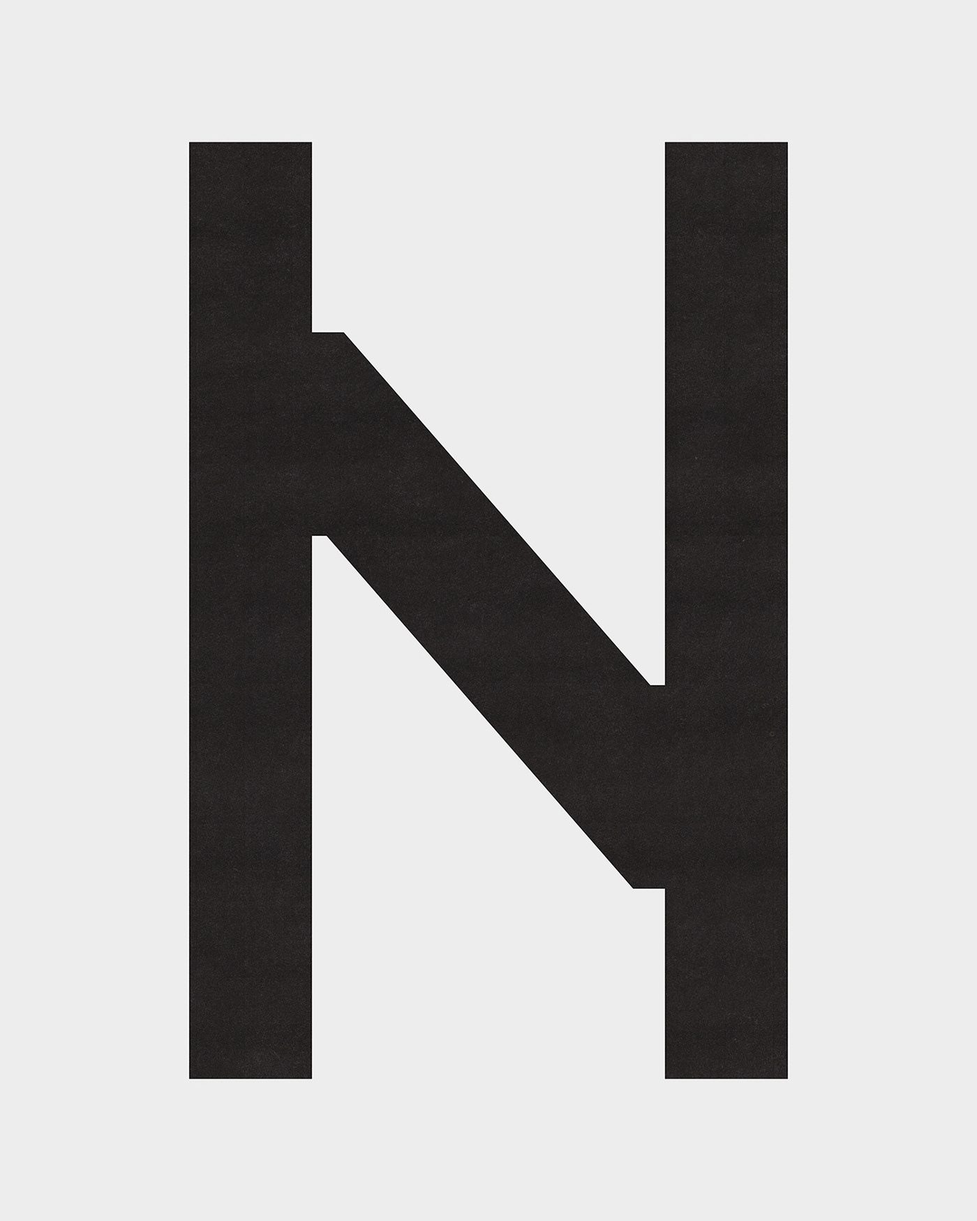 NUINO footwear repair branding giant octagonal letter N type specimen poster