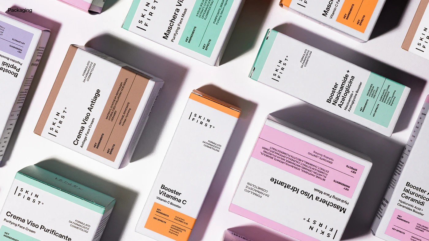 Skin First color-coded secondary packaging flat-lay by Uoi Studio