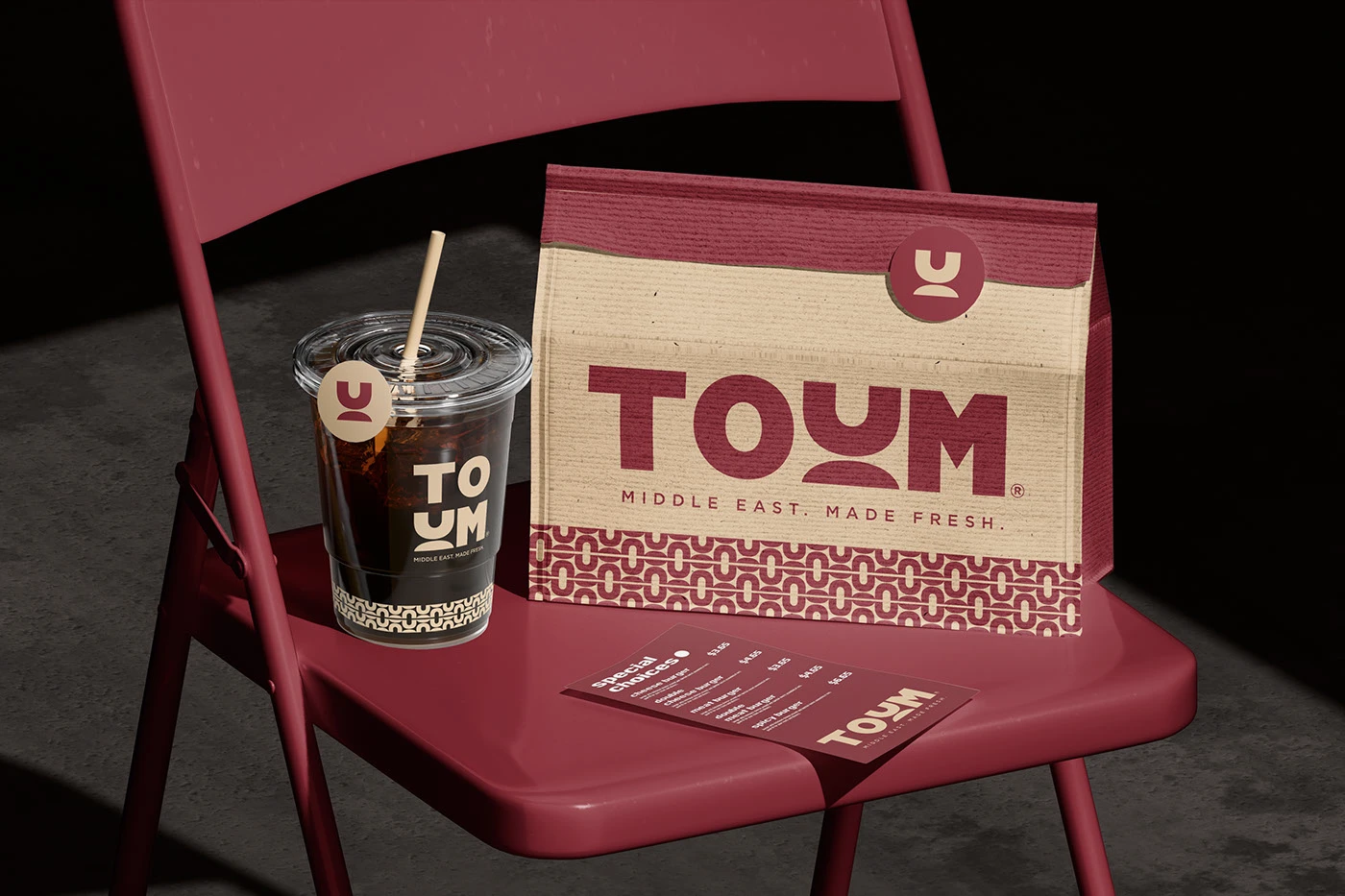 TOUM packaging box and takeaway wrap detail by Kashyap Bhatt