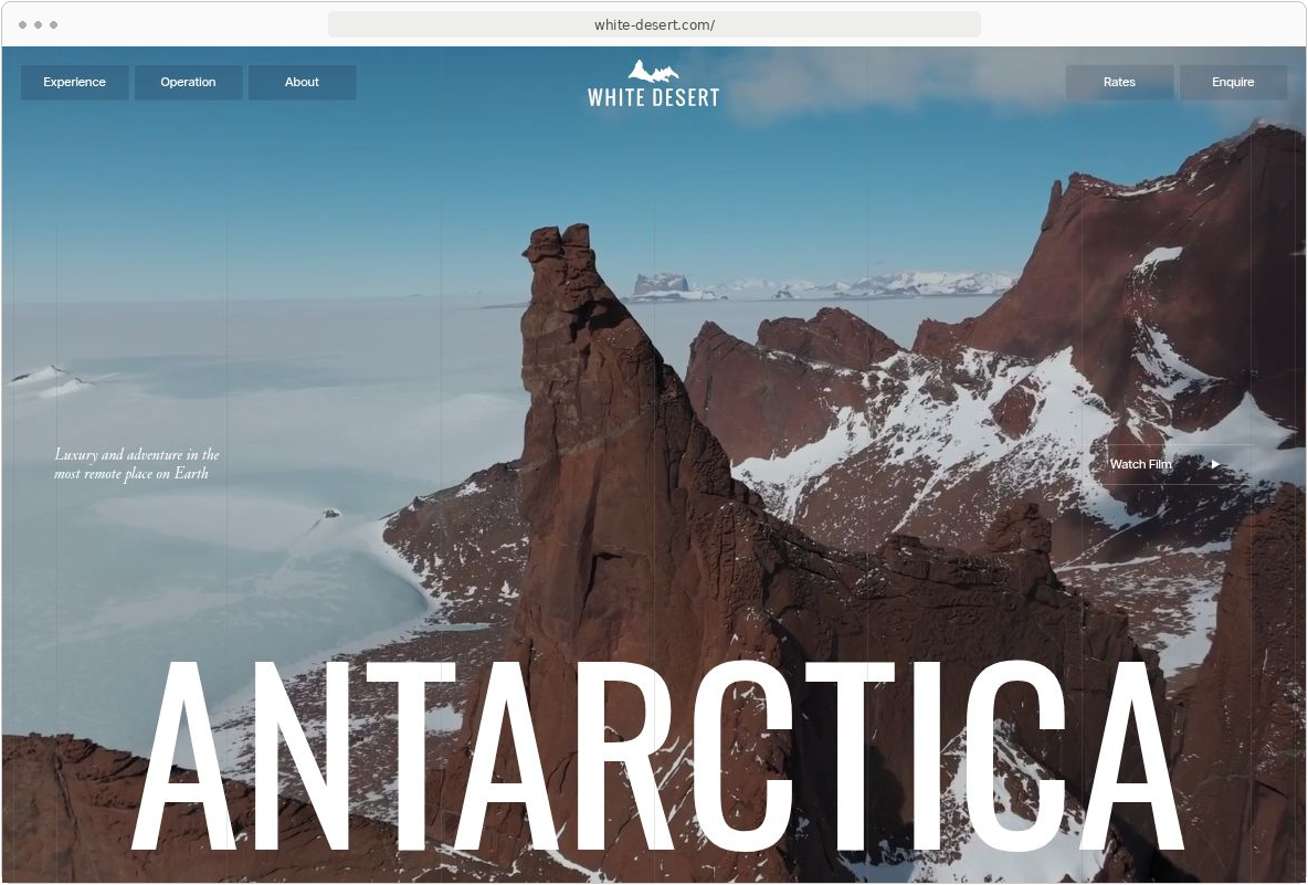 White Desert homepage with Antarctic scenery, a large destination title and fine vertical rules
