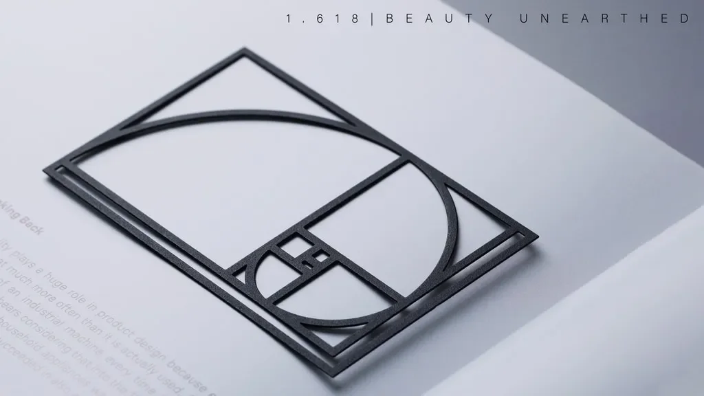 1.618 Golden Ratio Paperclip product design on open notebook