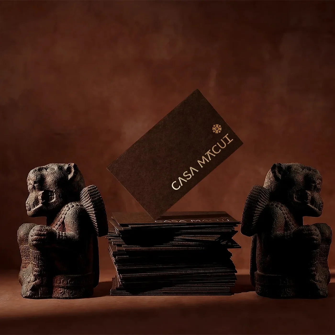 Casa Macui Mexican knife brand identity — copper-toned serif wordmark on near-black background