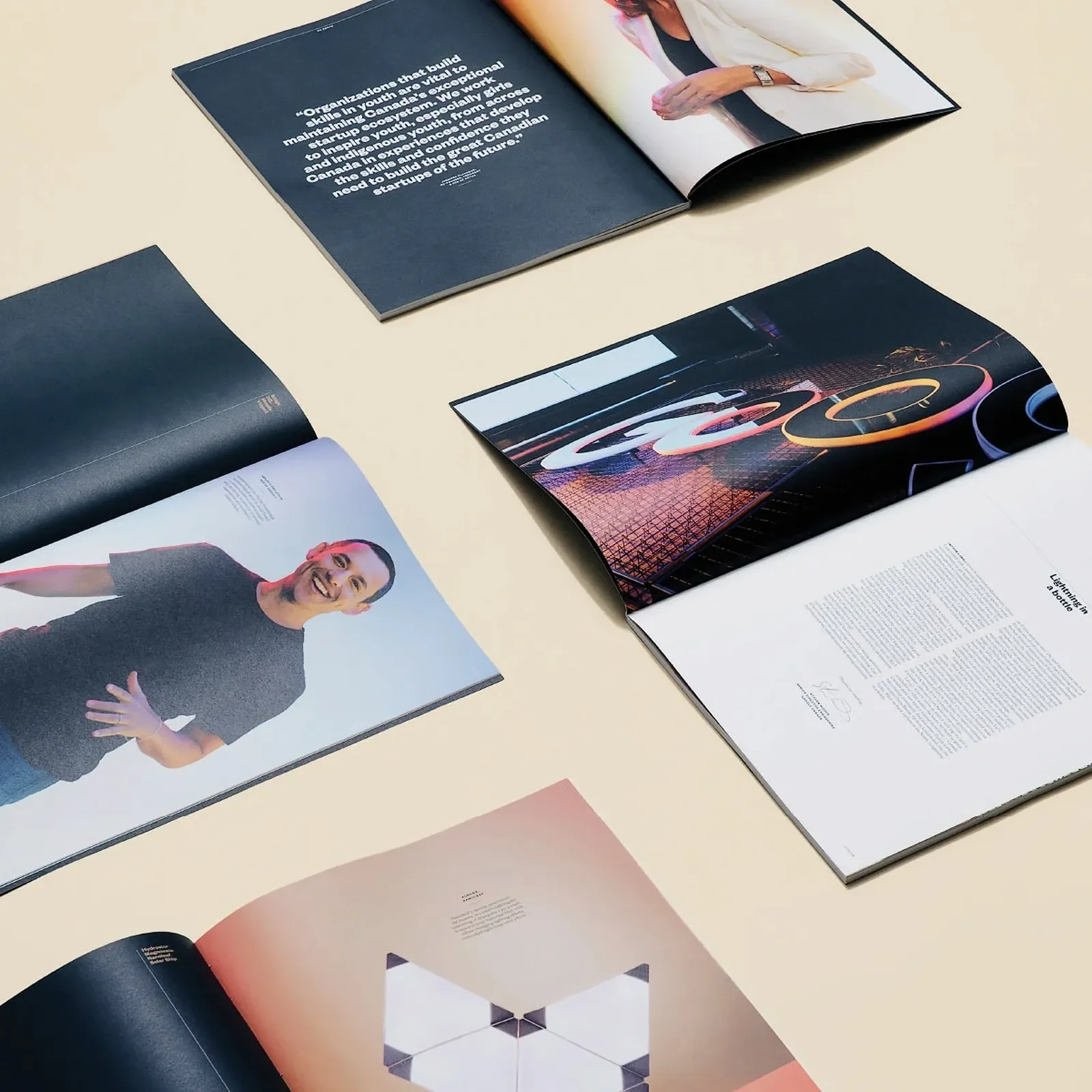 Flat-lay overview of open Google Go North spreads showing black chapter dividers and portraits — editorial design by Underline Studio