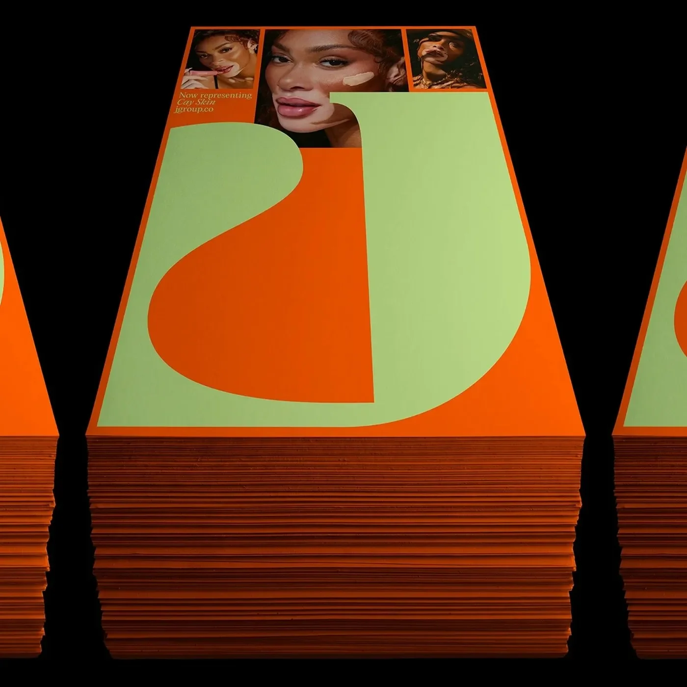 JGroup brand identity edge-colored promotional cards and sculptural J monogram by Rafael Cardoso