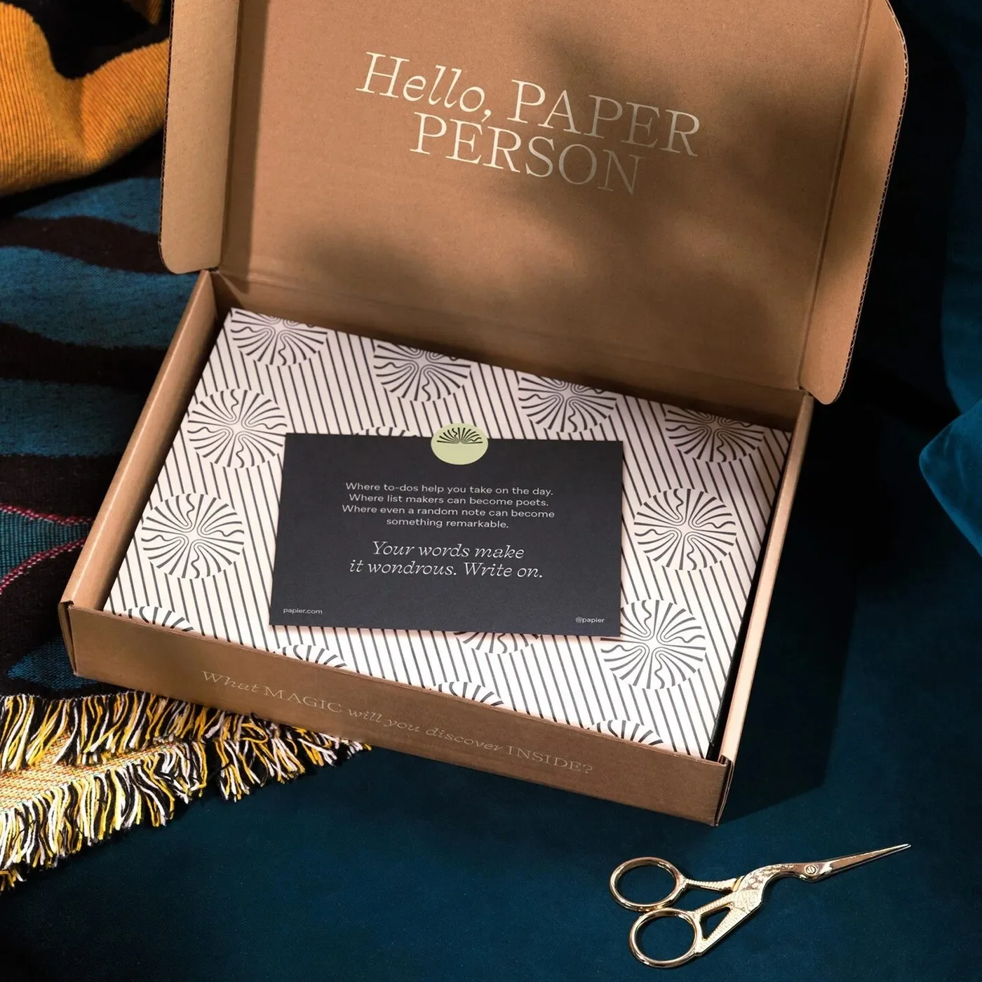 Unboxing presentation box with custom stationery packaging in Papier brand identity