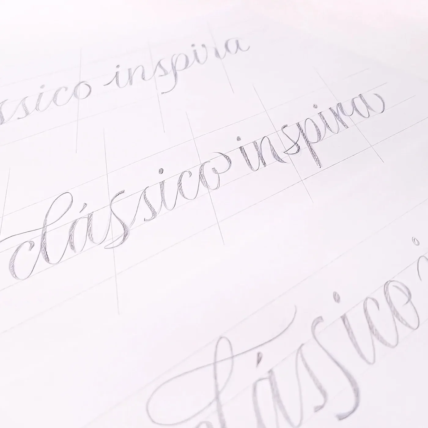 Calligraphic pencil sketches on construction grid for Reserva Script typography design by Plau