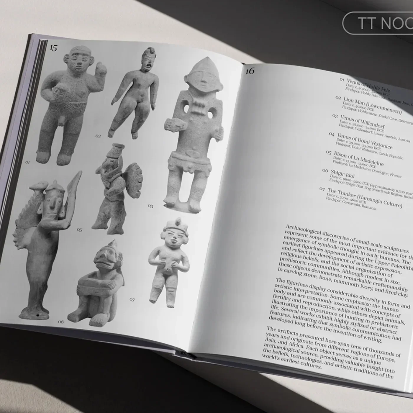 Printed exhibition catalog book spread featuring TT Nooks Serif typography design in natural light