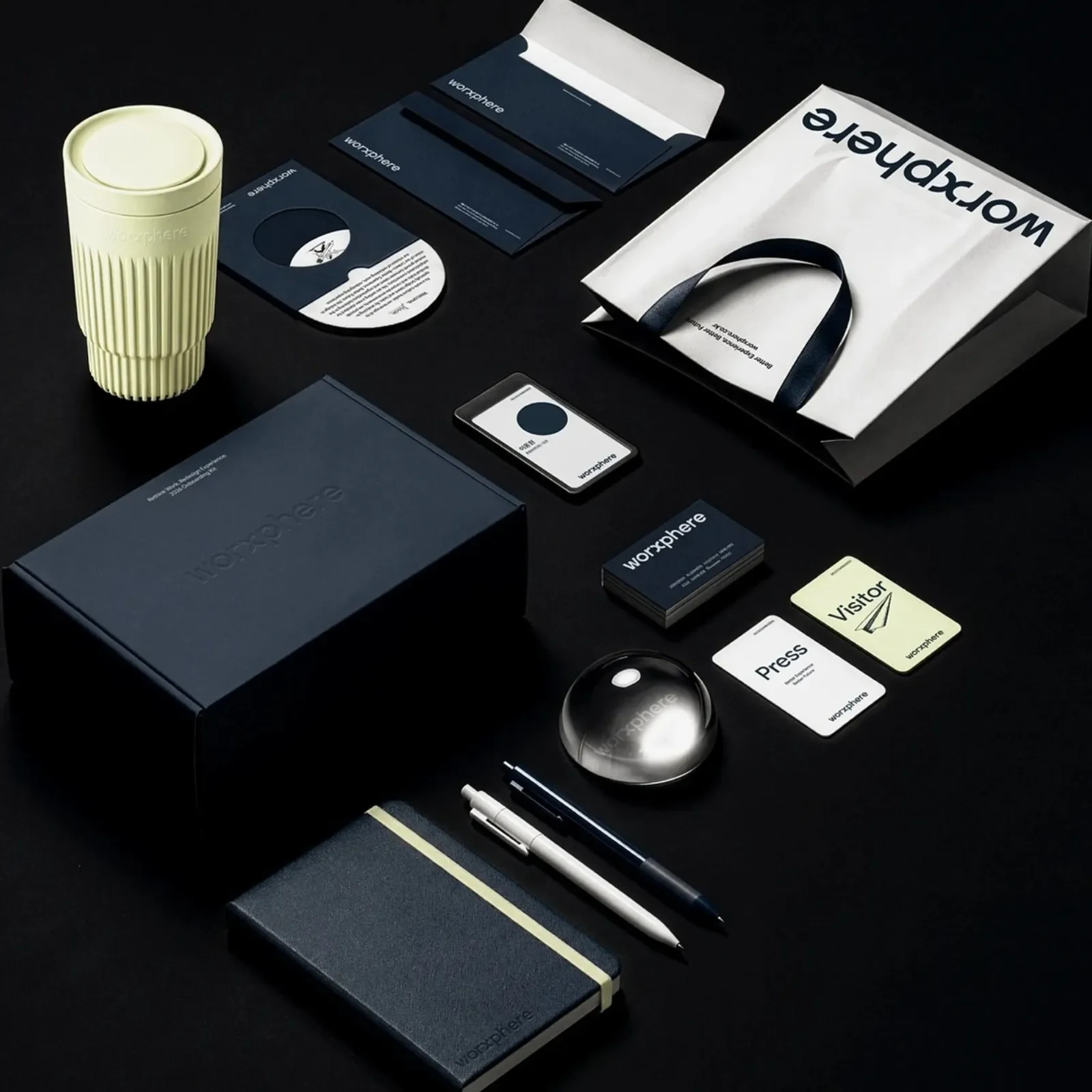 Worxphere brand identity wordmark over dark globe by Plus X