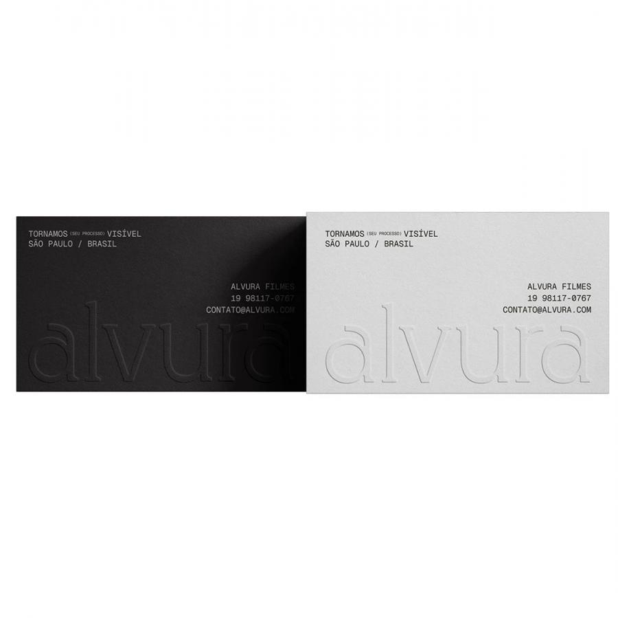 Alvura Filmes branding black and light grey business cards flat-lay by Gabriel Pio Couto and Edson Naves
