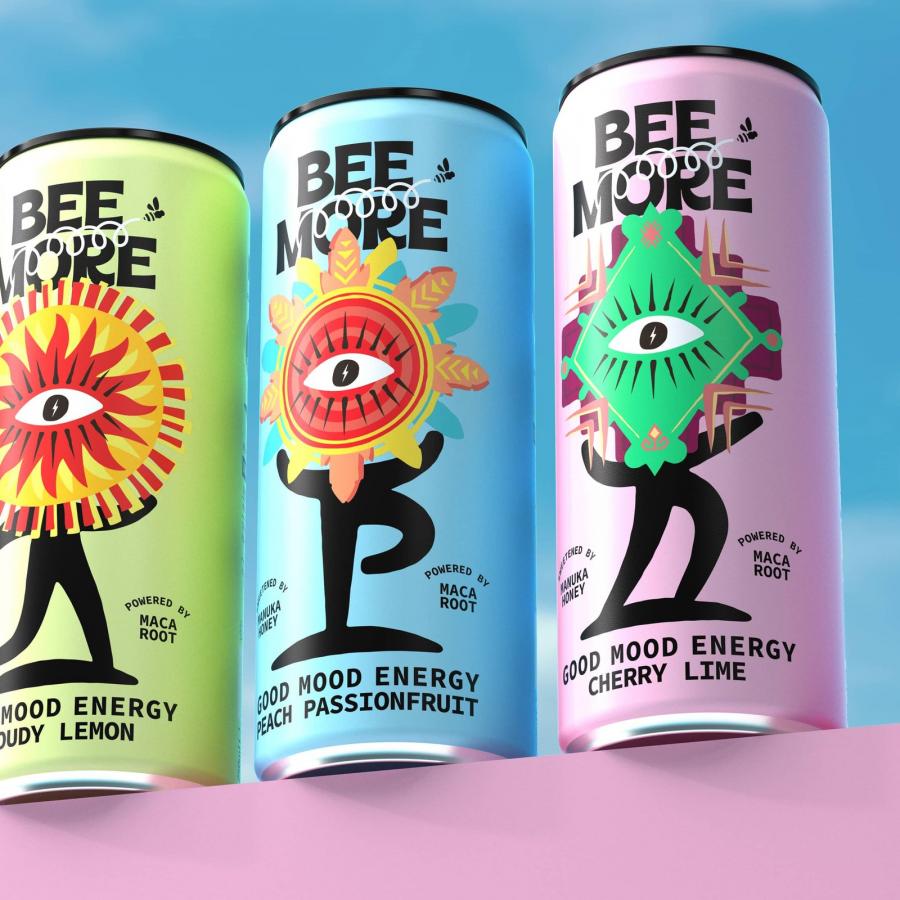 BeeMore wellness drink cans with totemic sun-and-eye art by Boundless