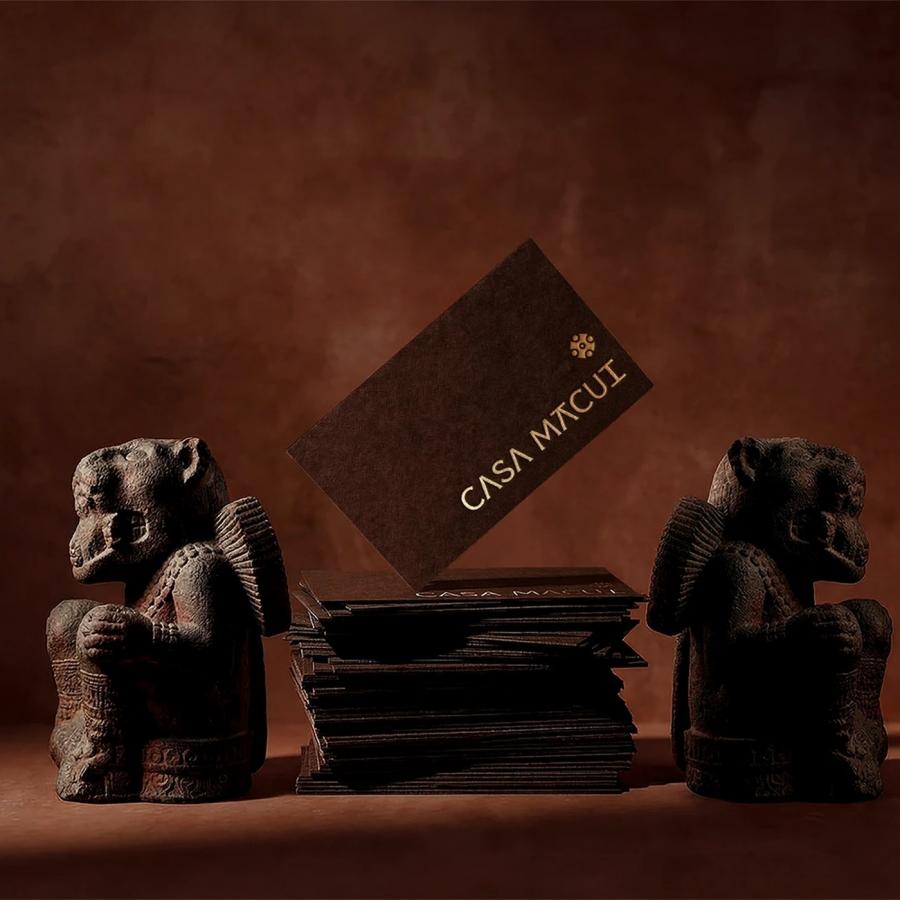 Casa Macui Mexican knife brand identity — copper-toned serif wordmark on near-black background