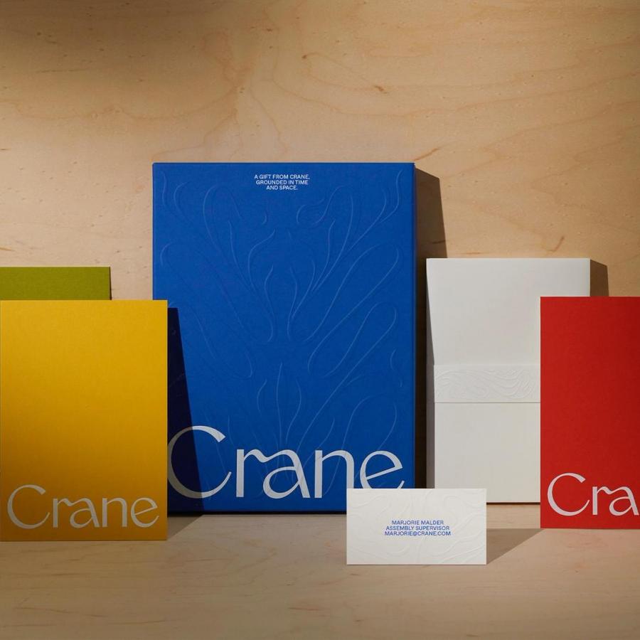 Crane branding and stationery system overview in cobalt blue, saffron yellow, olive green, and crimson red by COLLINS
