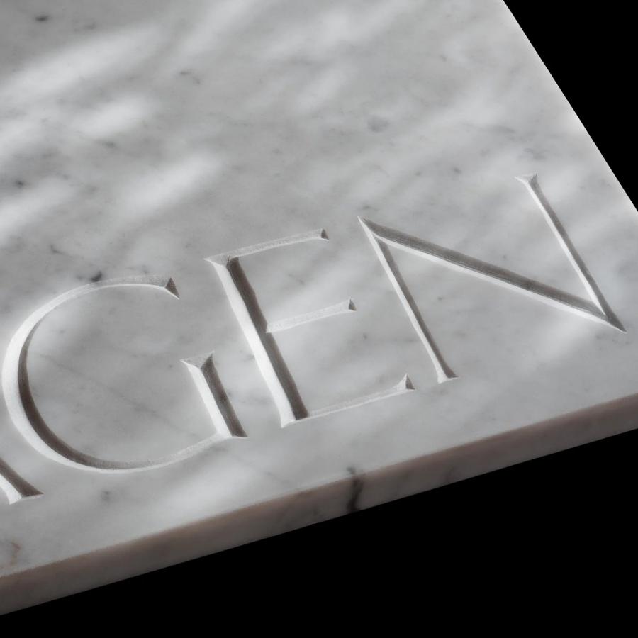 Artemisgatan street sign carved in white Carrara marble — typography by Letters from Sweden
