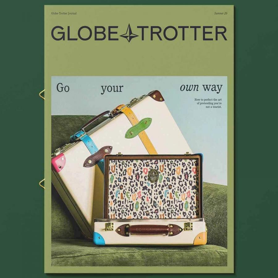 Globe-Trotter Journal Summer 26 brand board and print collateral suite flat lay featuring the North Star logo wordmark, typography pairing, and pastel luggage cases — brand identity by Ragged Edge