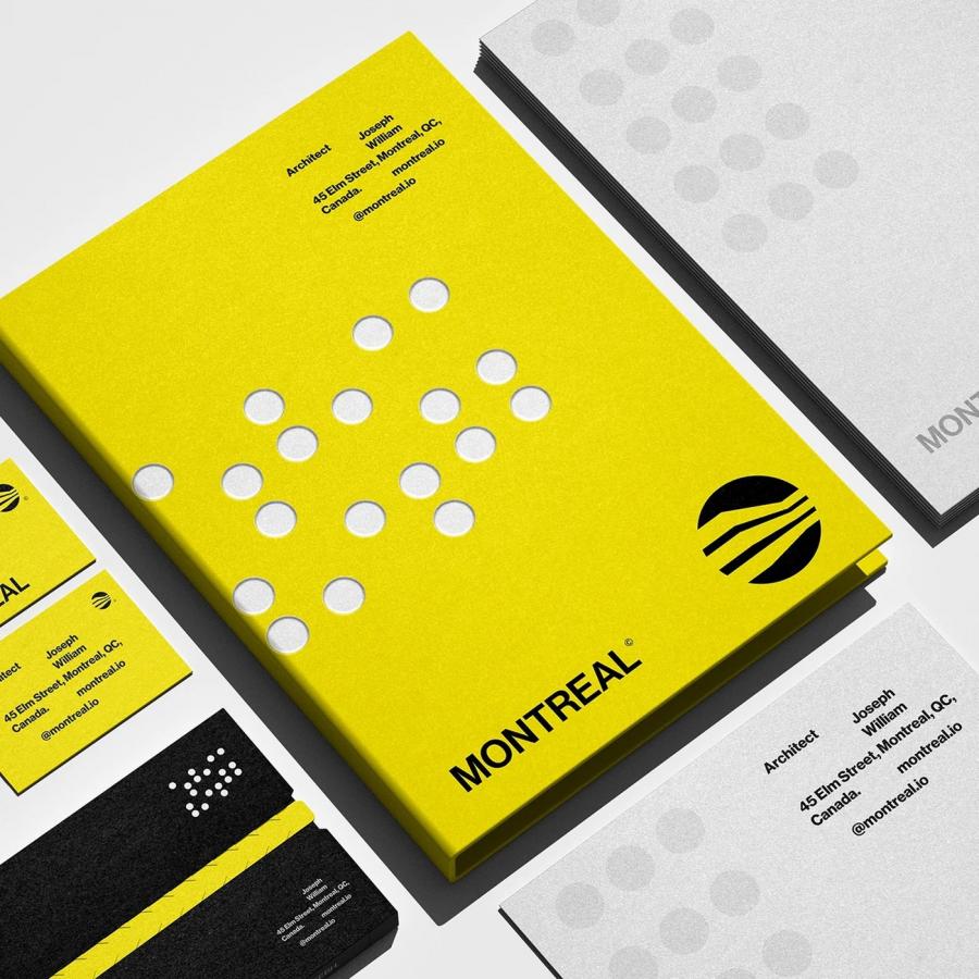 Montreal Architecture brand identity stationery flat lay with yellow presentation box and cards