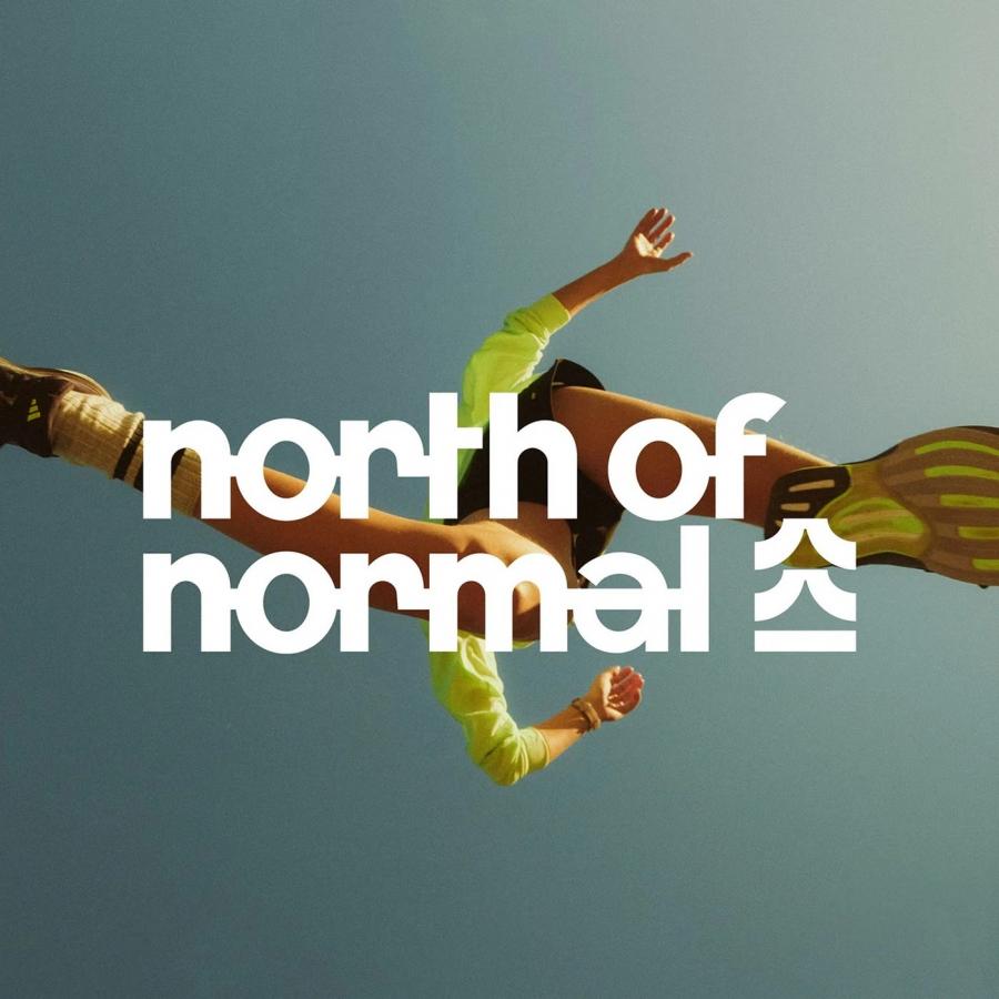 Overhead athletic runner jumping in sunlight with North of Normal branding design by Molnár Péter