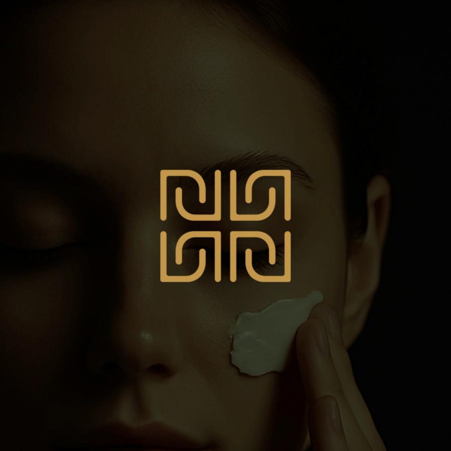 Nova Root skincare brand identity geometric monogram mark in hunter green and antique gold