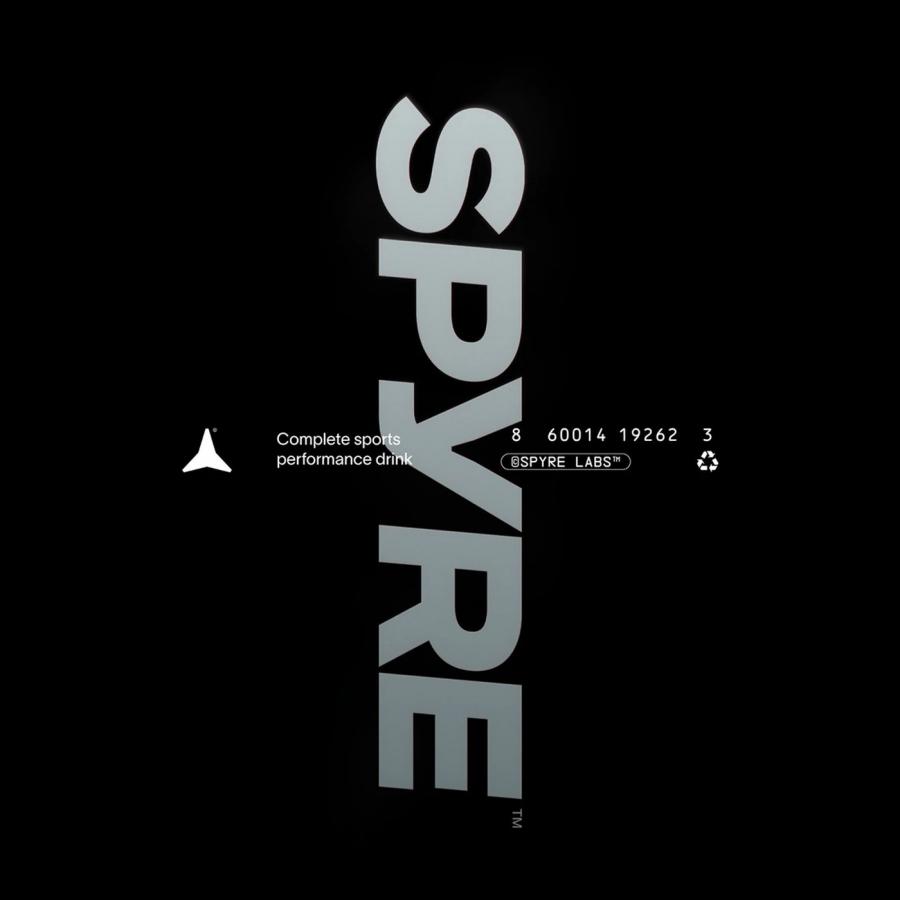 SPYRE sports drink packaging brand identity design — transparent bottle with near-colorless liquid by Hello Comrade