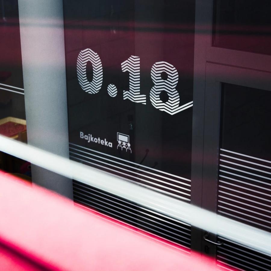 wayfinding system mediateka tychy blank studio glass surface graphics and safety markings