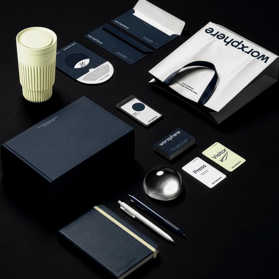 Worxphere brand identity wordmark over dark globe by Plus X