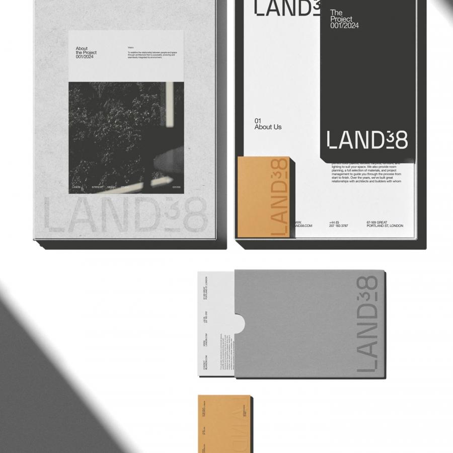 LAND38 brand visual identity stationery flat lay with debossed boxes and cards